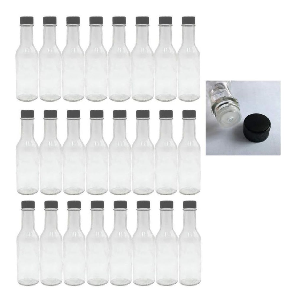 Bouteille Woozy de 1417 g possédant bouchon nervuré noir ainsi que réducteur d'orifice